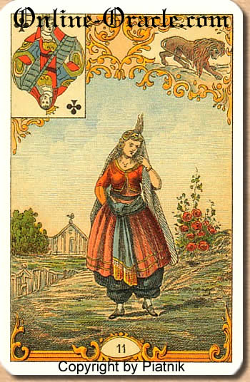 A brunette woman, Destin Antique fortune telling cards with divination and cartomancy